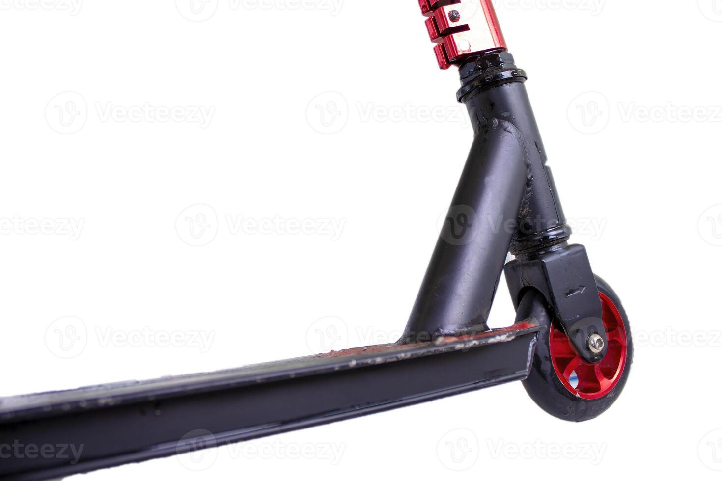 Close-up of a scooter with red wheel photo