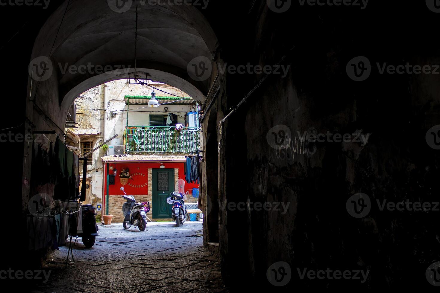 Colorful Streets of Naples, Italy. Low Angle View of Buildings and Narrow Street photo