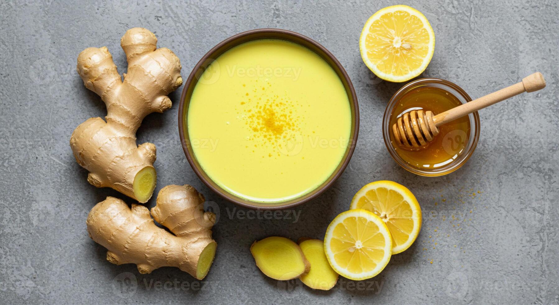 A warm, inviting cup of golden milk made from fresh lemon, honey, and ginger, offering a soothing blend of flavors for health and relaxation photo