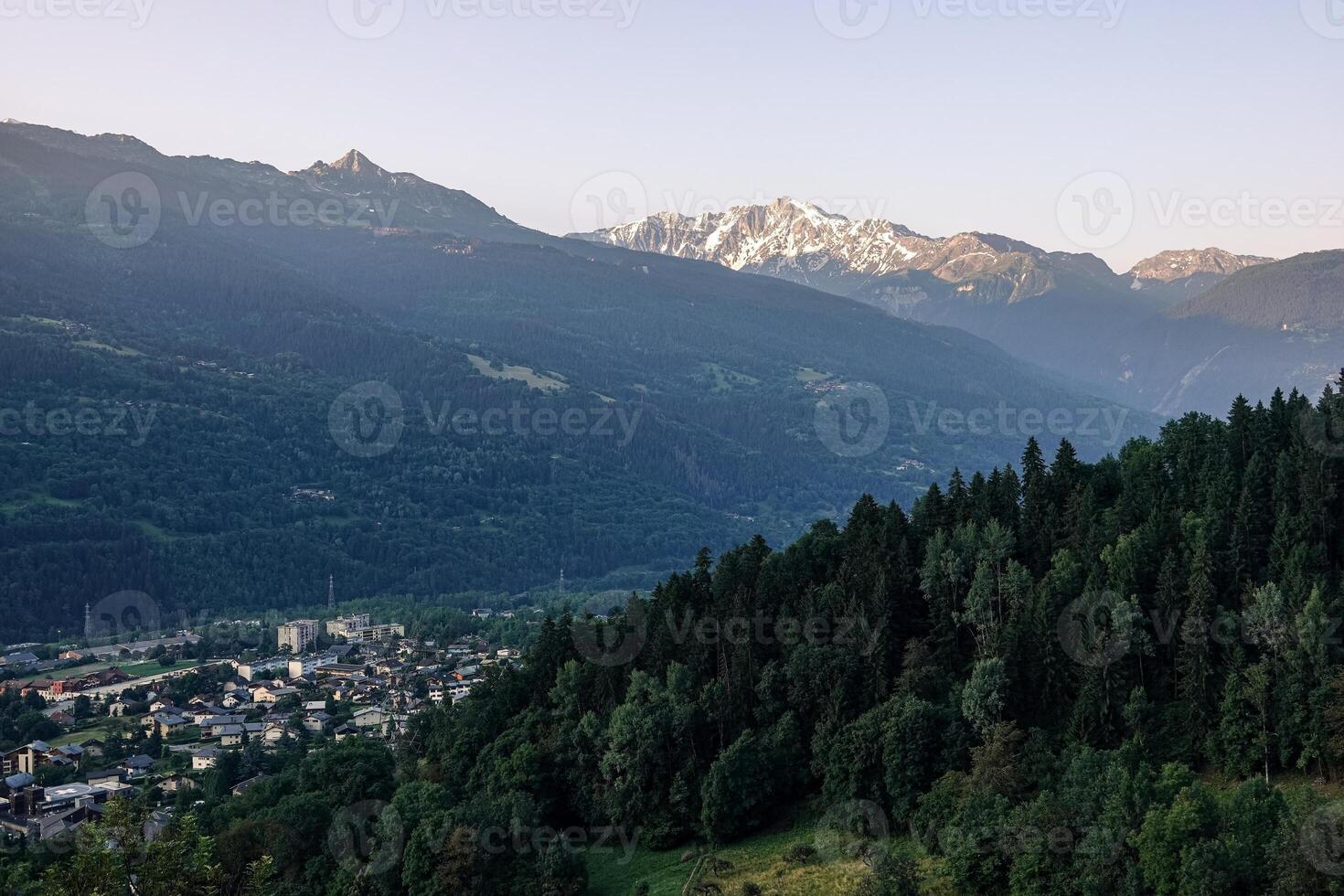 Panoramic view from above of the Tarentaise massif and valley at sunrise in summer photo