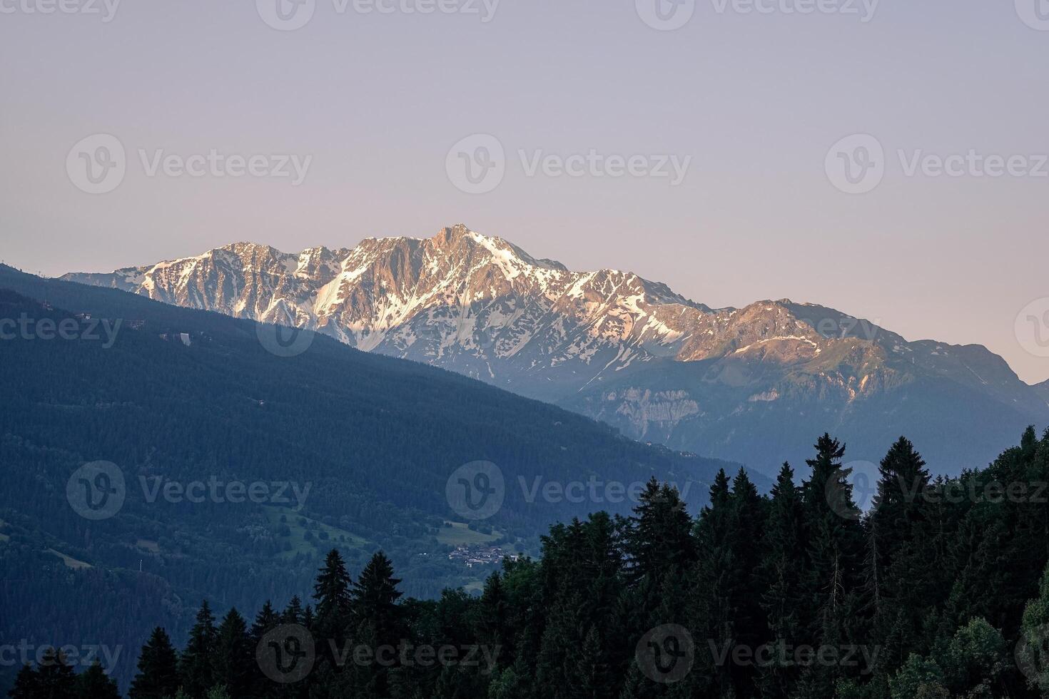 High view of the Tarentaise massif at sunrise in summer photo