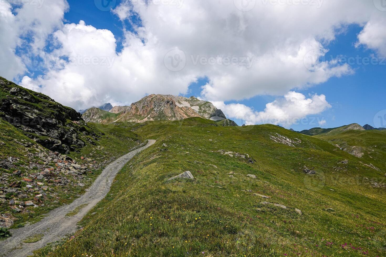 Hiking trail in the mountains in Savoie at Bourg-Saint-Maurice photo