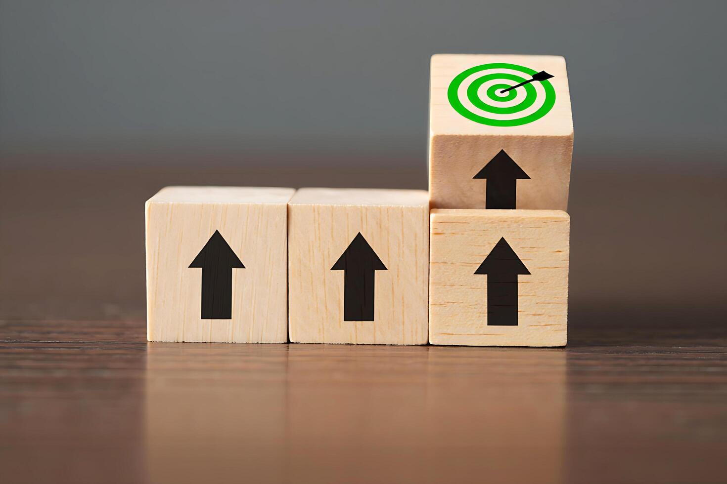 Wooden blocks with upward arrows and target green circles photo