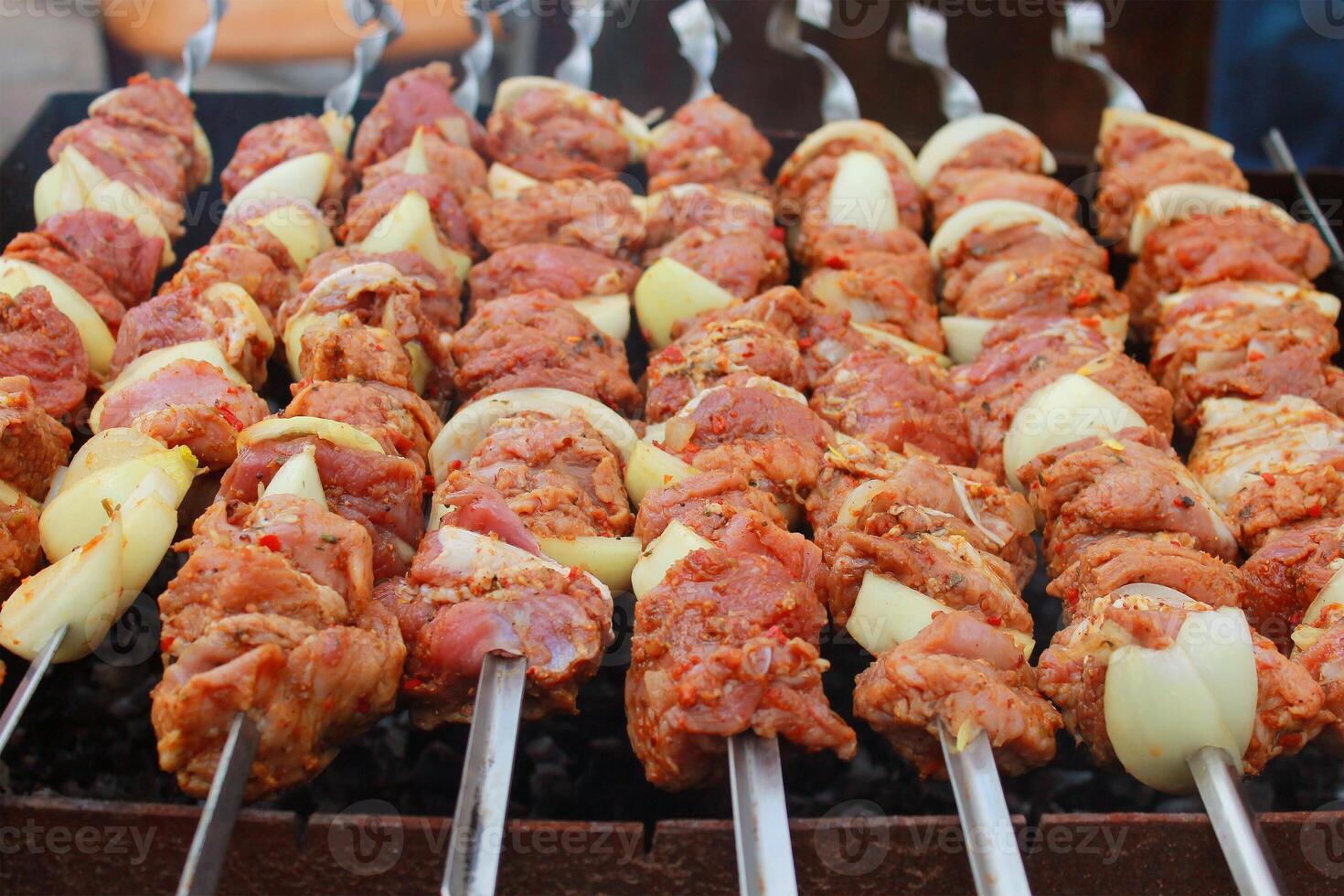 Raw meat for grill barbecue on a brazier photo