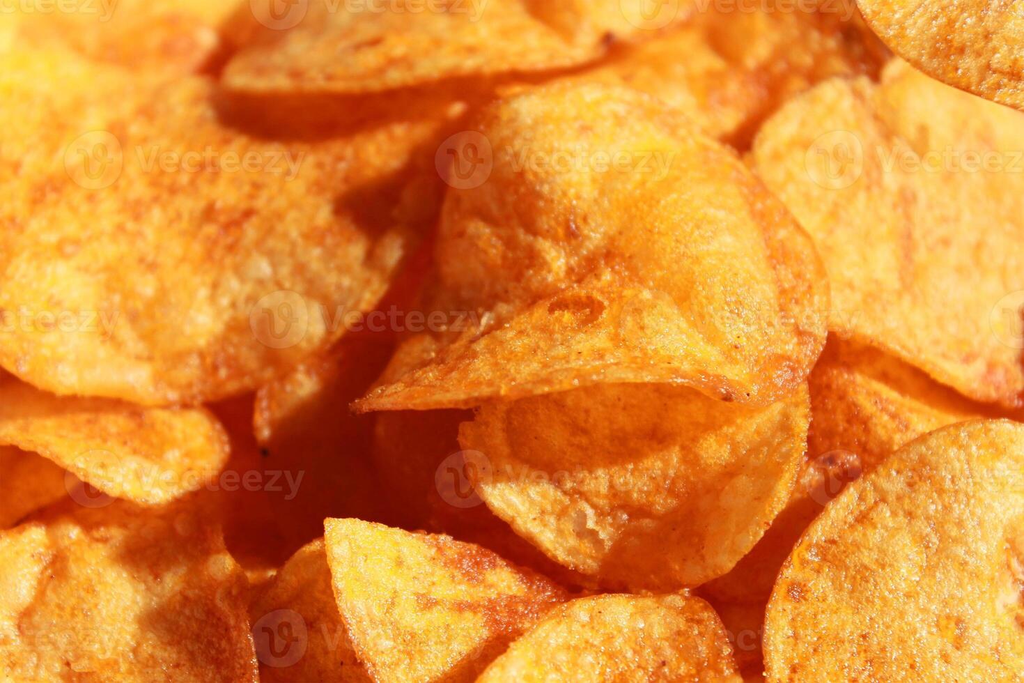 Crisps. Potato paprika chips background photo