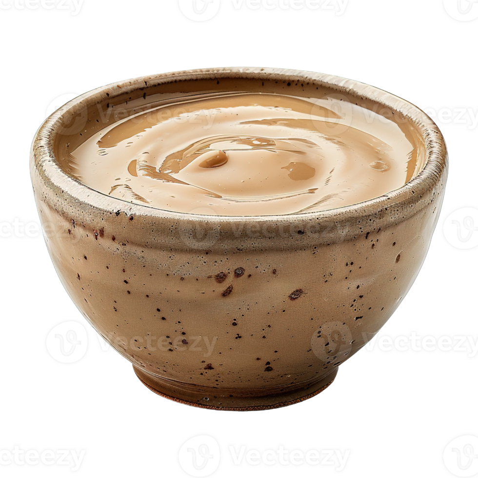 Close-Up of Creamy Tahini in Handmade Earthenware Bowl Isolated on Transparent Background png