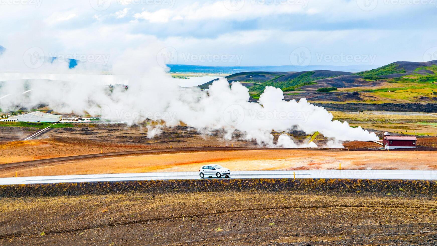 Geothermal activity with smoke at Myvatn Lake, Iceland. photo