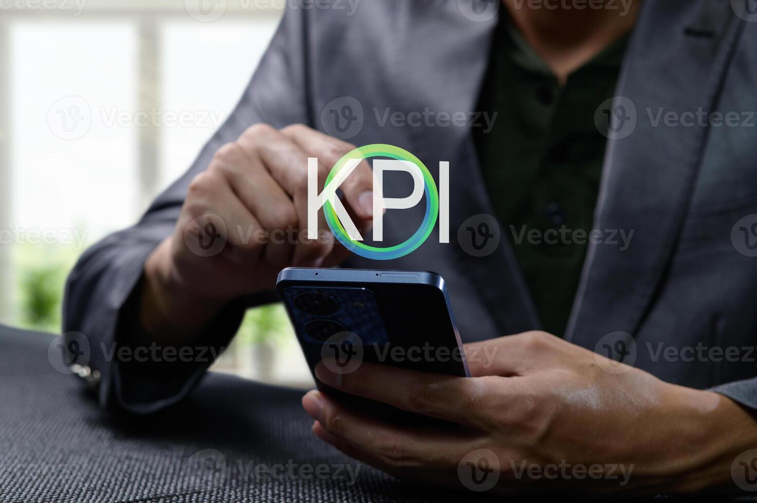 Businessman Analyzing Key Performance Indicators on Smartphone photo