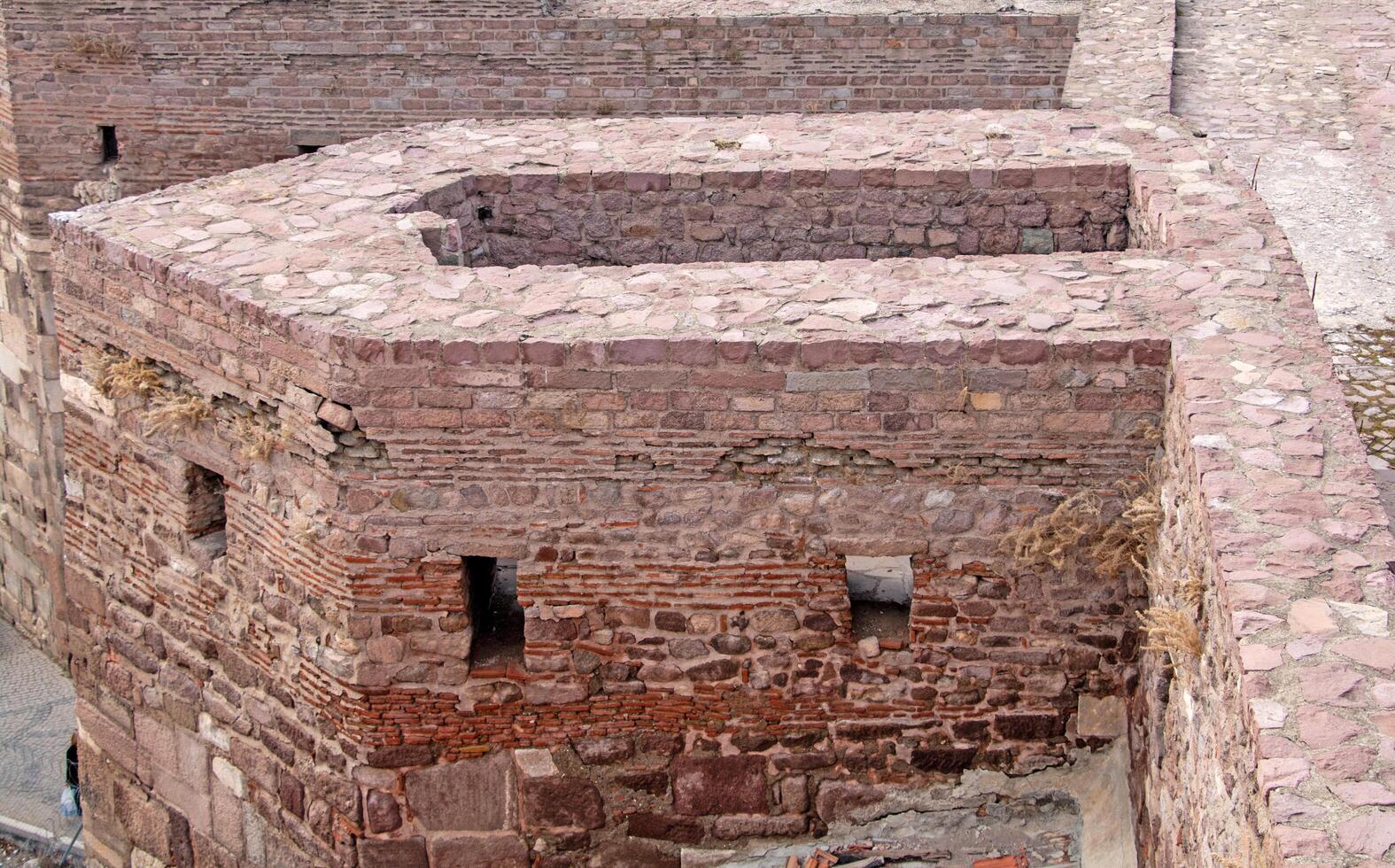 Ancient Fortress Walls Detailed Texture of Historic Brickwork and Stone Masonry photo