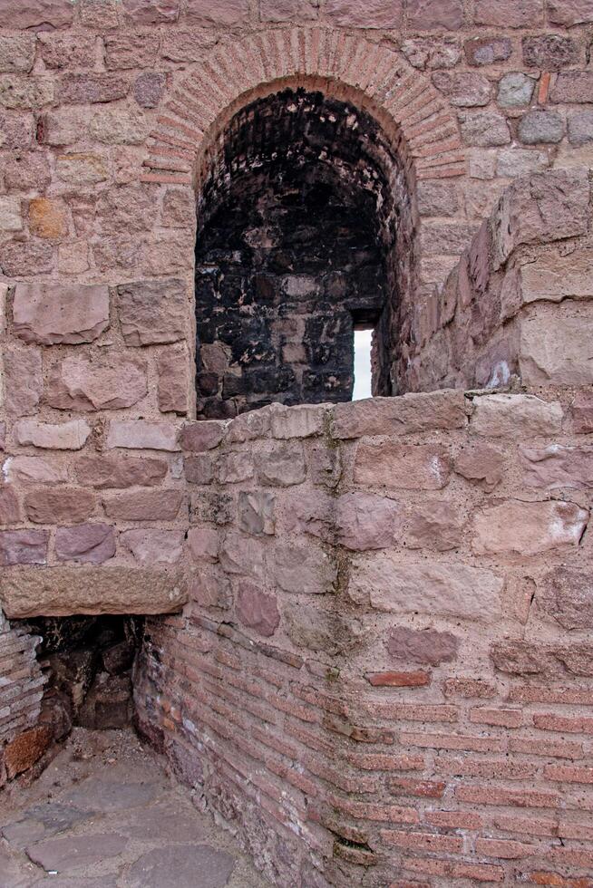 Ancient Stone Archway Architectural Detail of Historic Wall photo