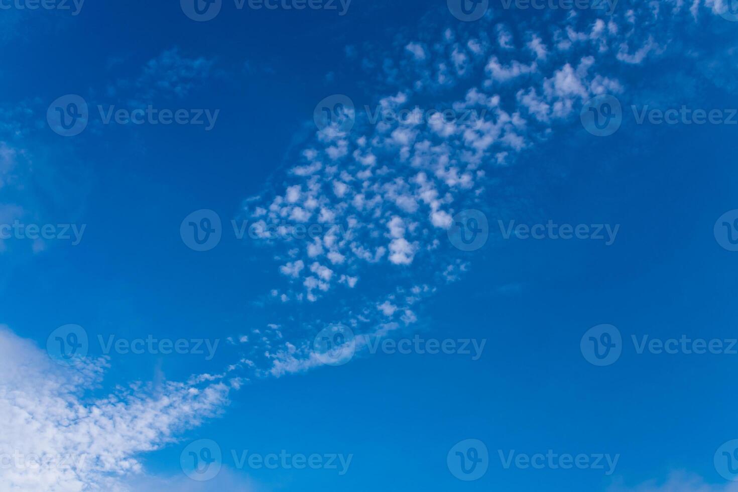 White Clouds in the blue sky background photo