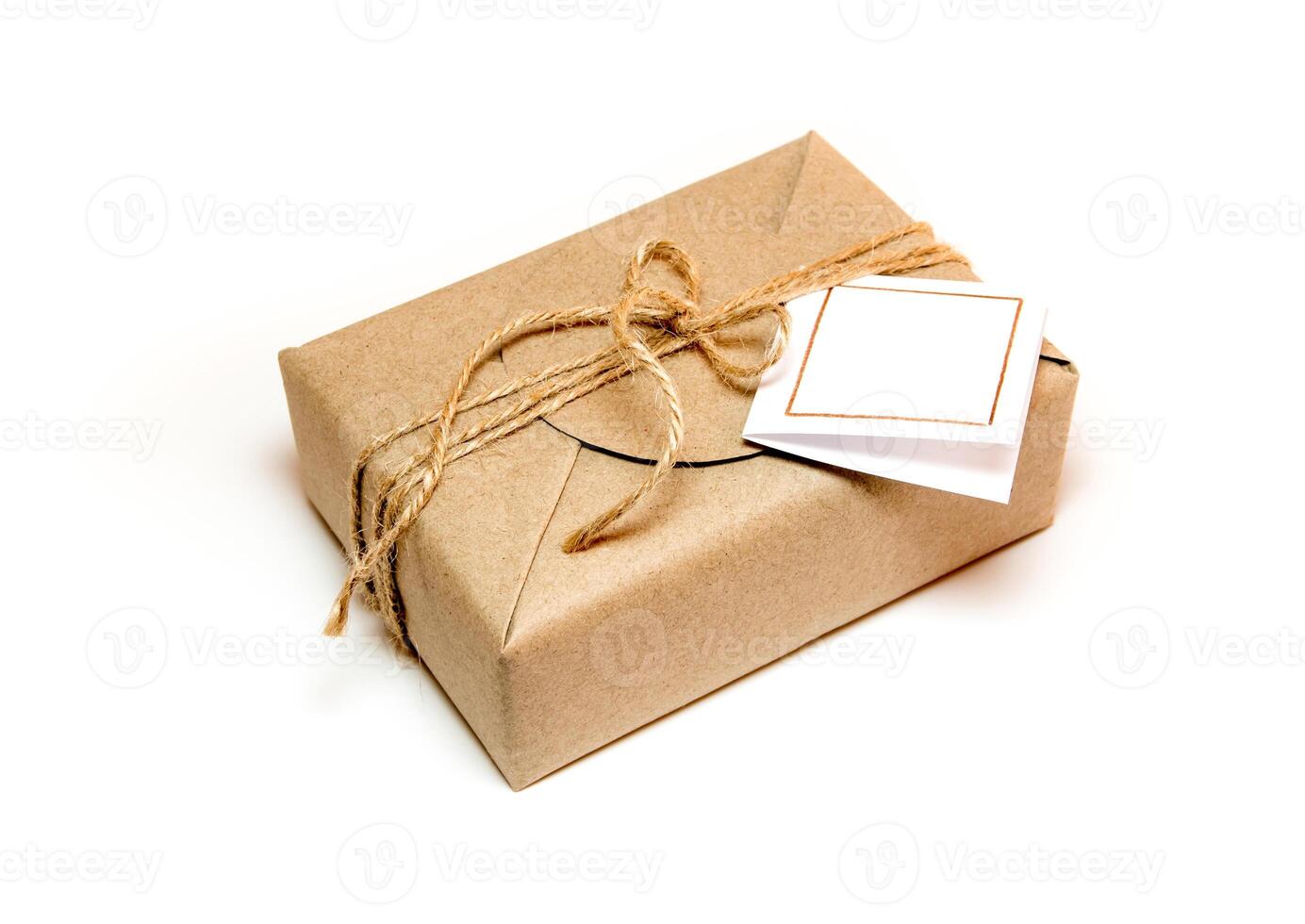 The Gift box wrapped in the kraft paper and rustic hemp as natural rustic style photo