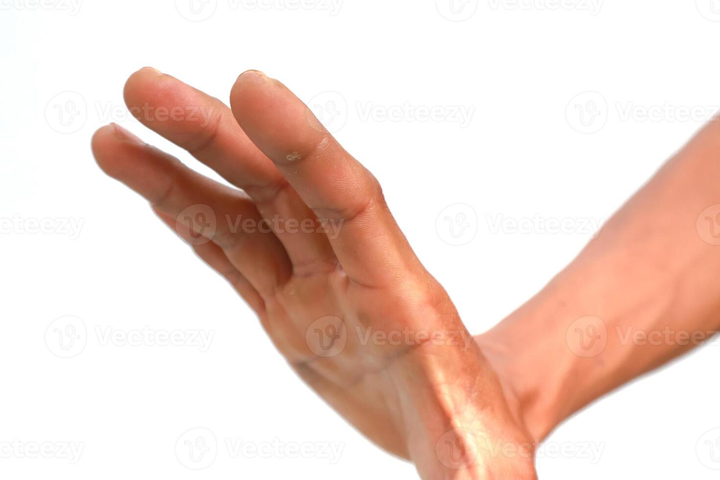 Isolated Human Hand Displaying a Gesture of Refusal or Protection Against White Background photo