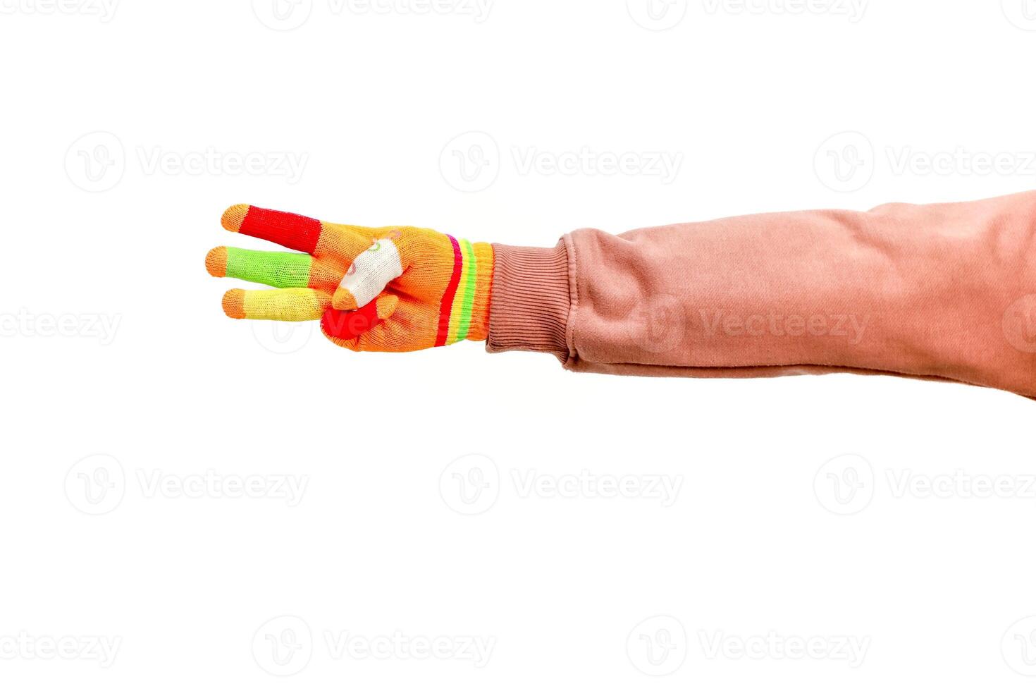 A colorful hand showing the number three on a white background conveys a playful vibe photo