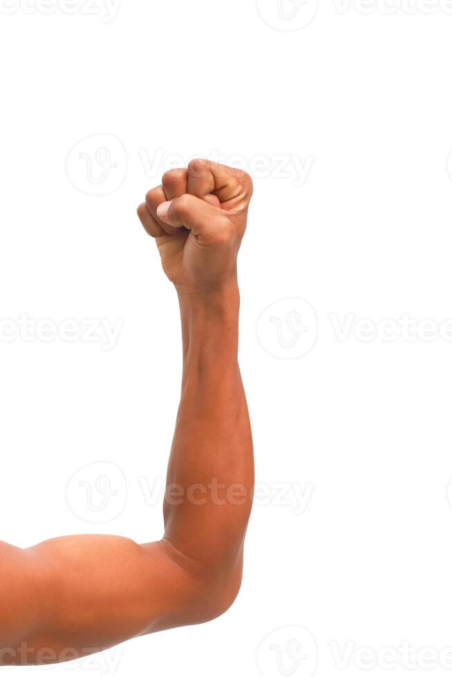 A Strong Arm with a Clenched Fist Raised in the Air, Isolated on White Showing Power photo