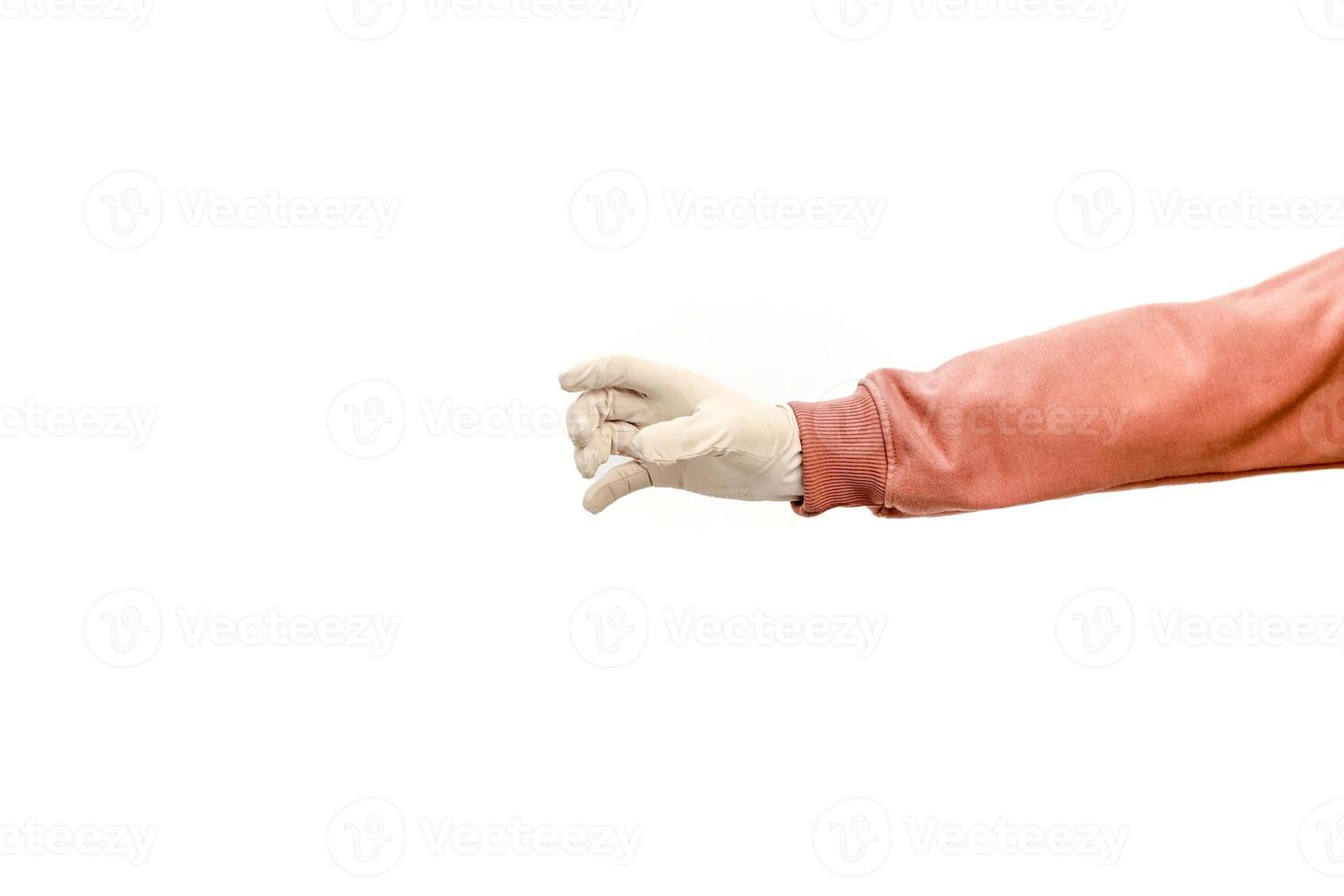 Isolated Arm with Glove Reaching to Grab or Pinch in a Professional Setting photo