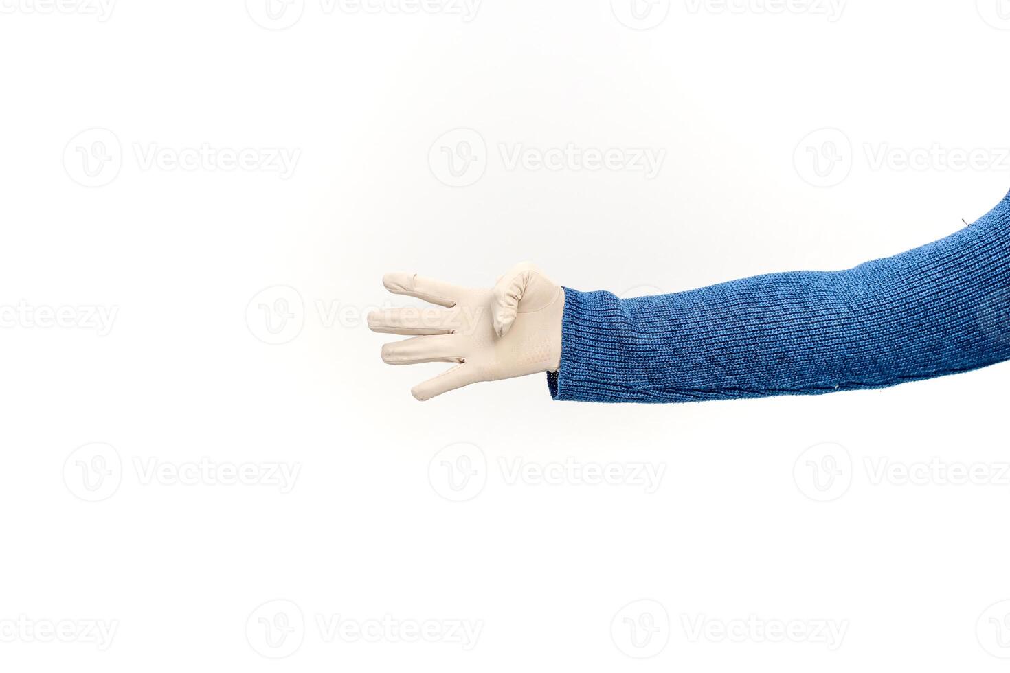 A Healthcare Worker's Hand Protected with a Surgical Glove, Ready to Serve and Ensure Safety photo