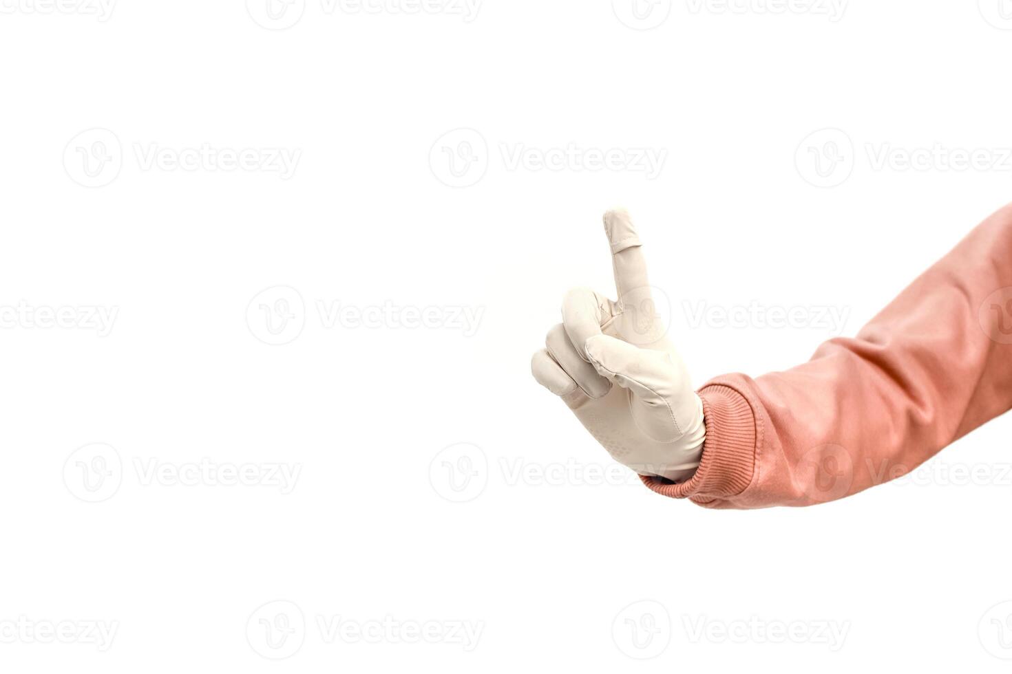 Isolated hand wearing a medical glove with a finger bandage against white backdrop photo