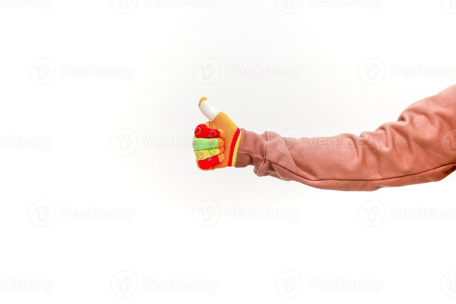 Hand in a Colorful Glove Giving a Thumbs Up on a Clean White Background Image photo