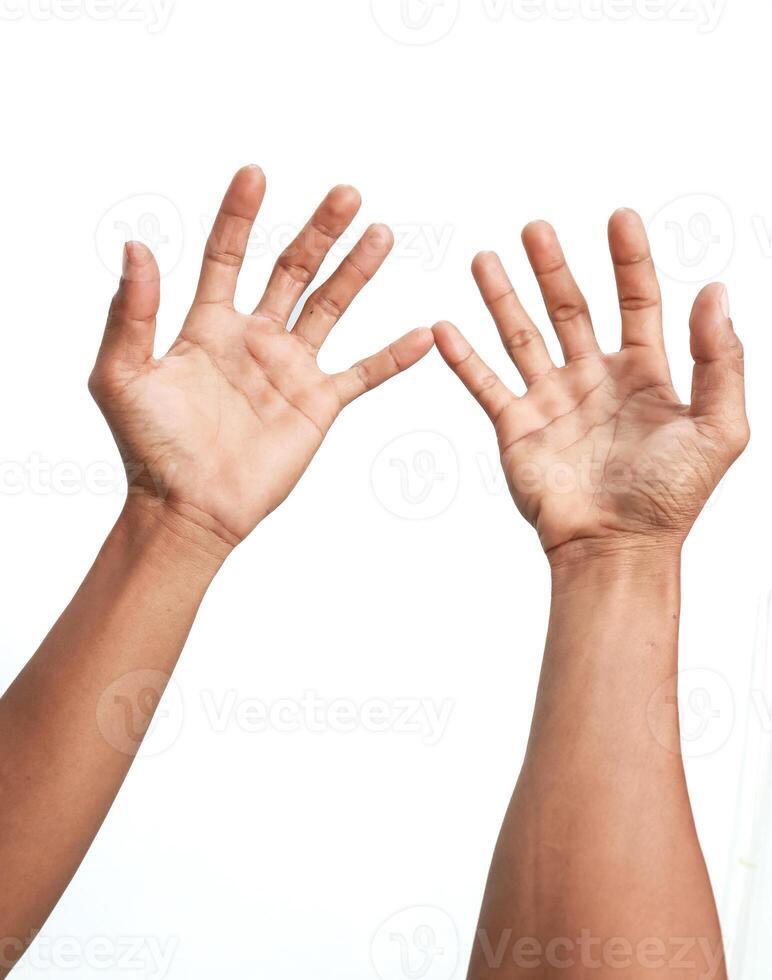 Close-up of outstretched hands against a clean white background, offering or presenting an abstract gesture photo