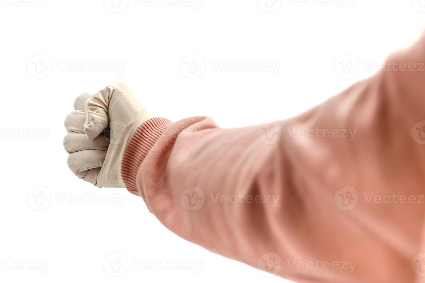 A protective gloved fist isolated on white, symbolizing safety and cleanliness, with focus on healthcare and hygiene practices. photo