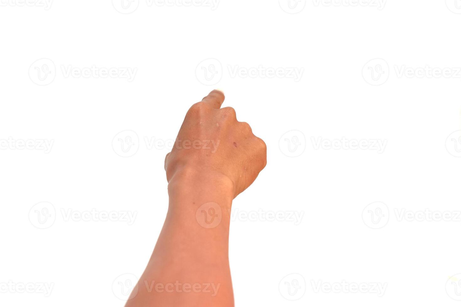 Close-up of a raised hand pointing upwards against a white background offering design flexibility photo