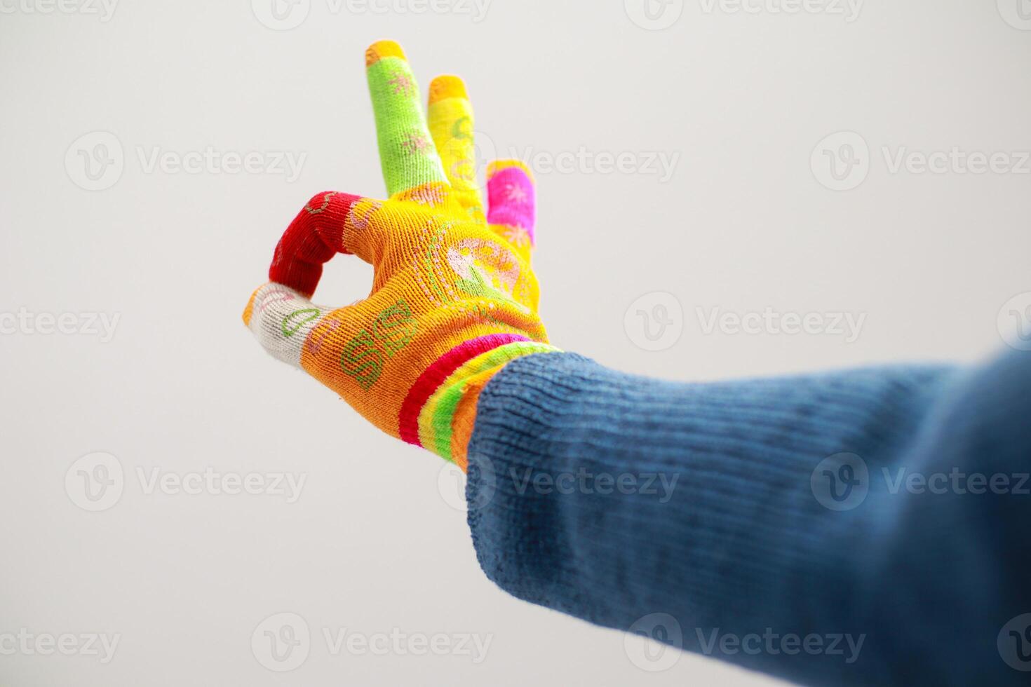 A Vibrant Display of Approval with Unique Artistic Gloves photo