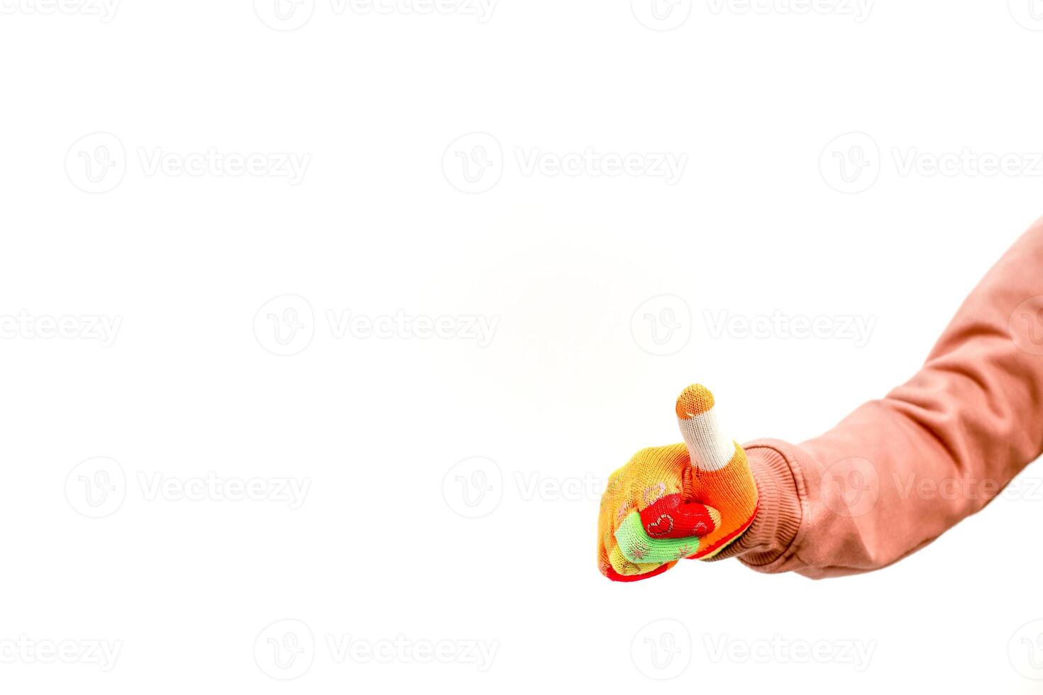 A hand wearing a gardening glove giving a thumbs up gesture on a white background indicates approval and positivity photo