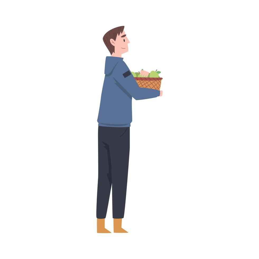 Young Man Carrying Wicker Basket Full with Gathered Apples Illustration vector