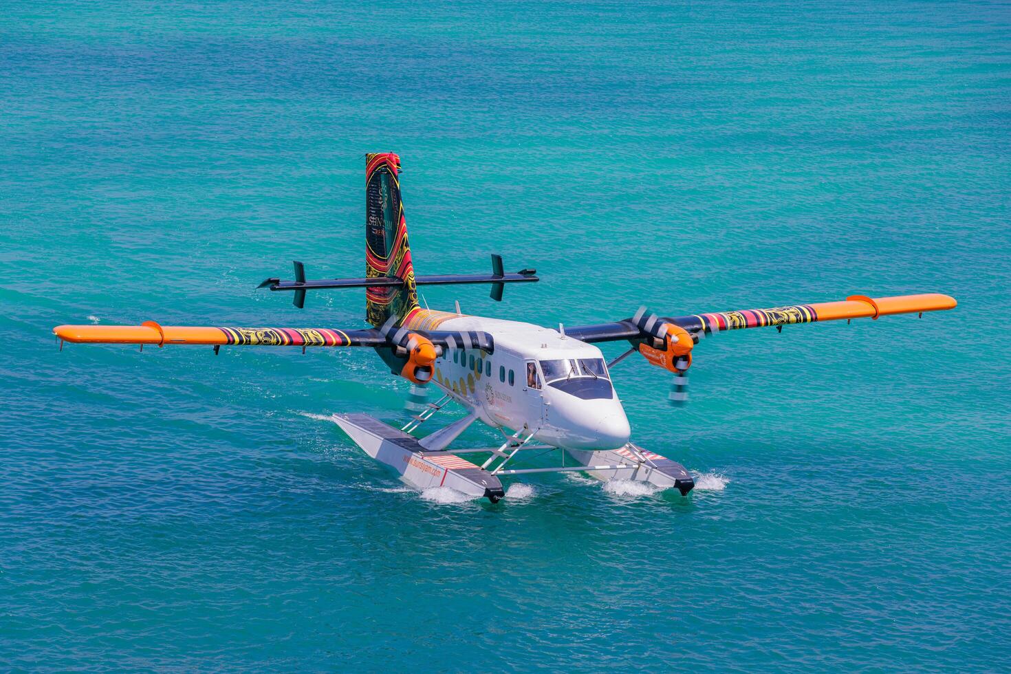 03.13.23. Male Aerial Maldives seaplane dock taxi on turquoise tropical lagoon summer travel vacation luxury transportation island paradise escape photo