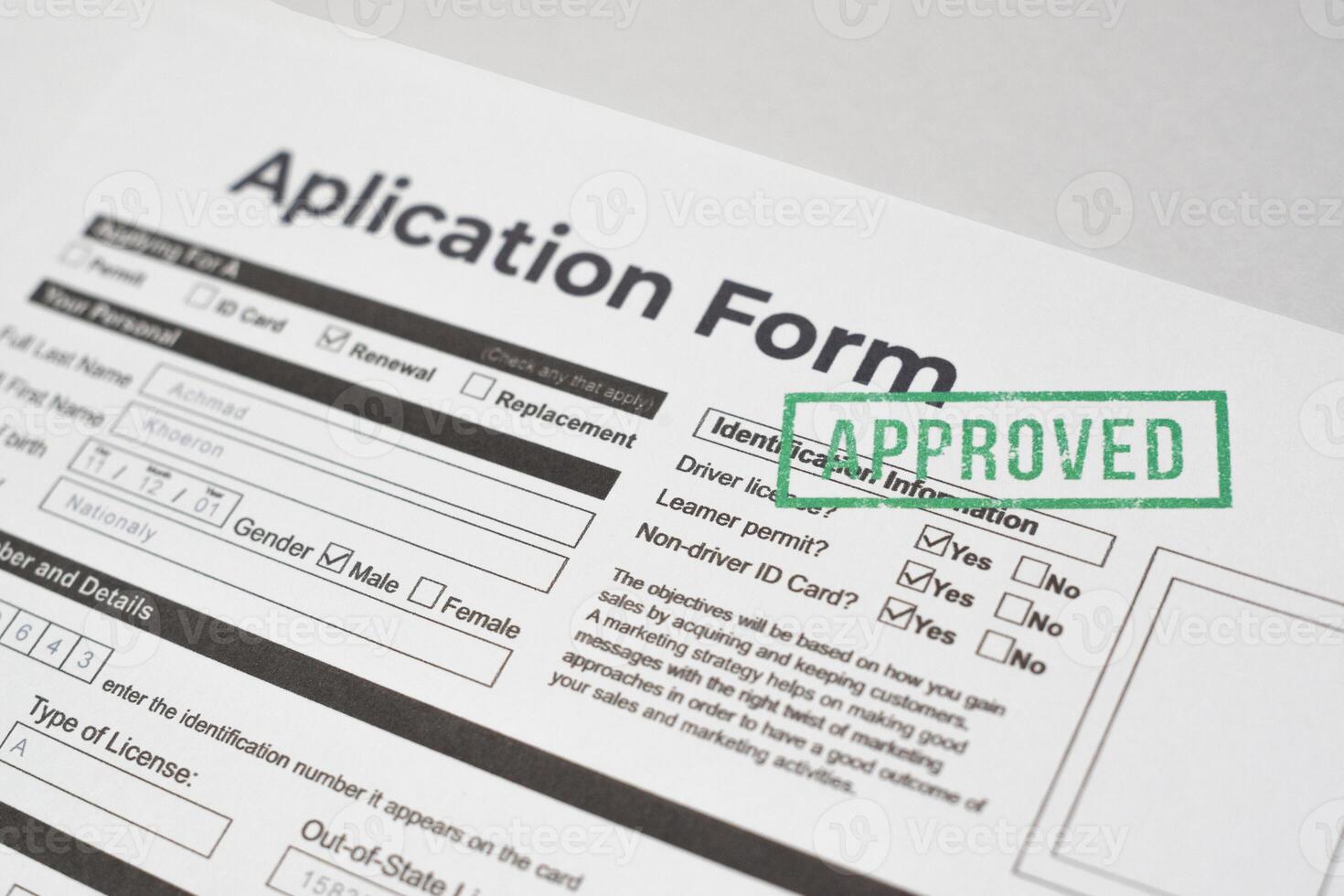 Application Approved Form Stamped Document Closeup photo