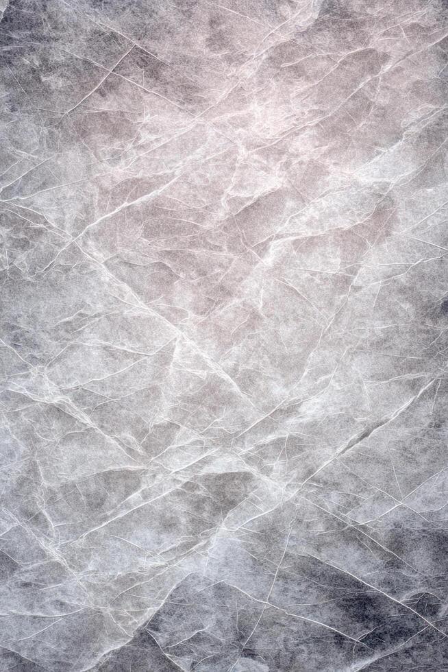 Intricate network of fine, interconnected lines spreading across a textured, neutral-toned surface. photo