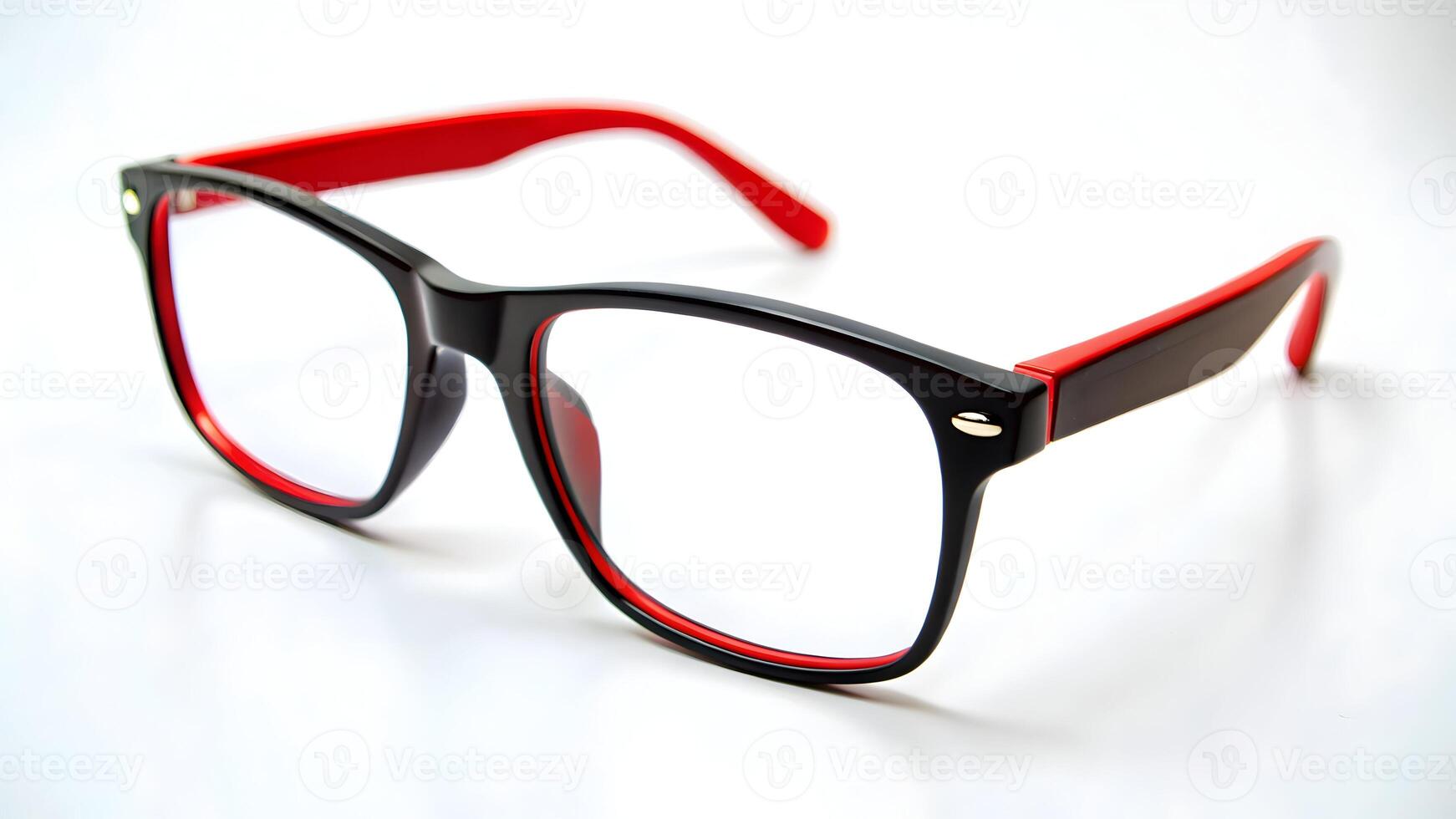 A close up shot of black framed glasses with red accents on a black background in a studio shot photo