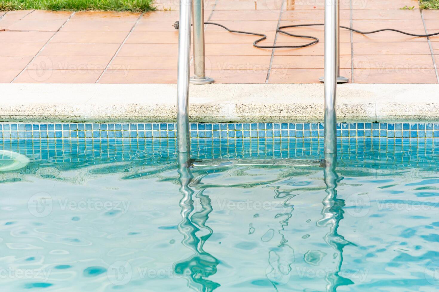 Summer Holiday Scene By the Edge of the Swimming Pool. photo