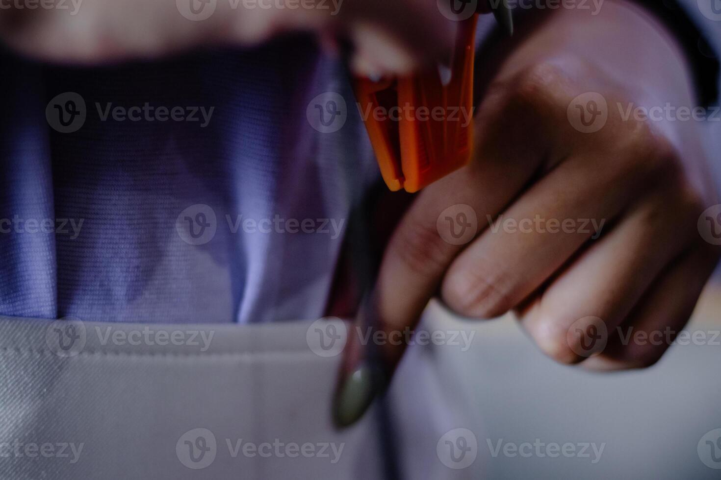 Close-up of Hands Assembling a Model with Precise and Meticulous photo