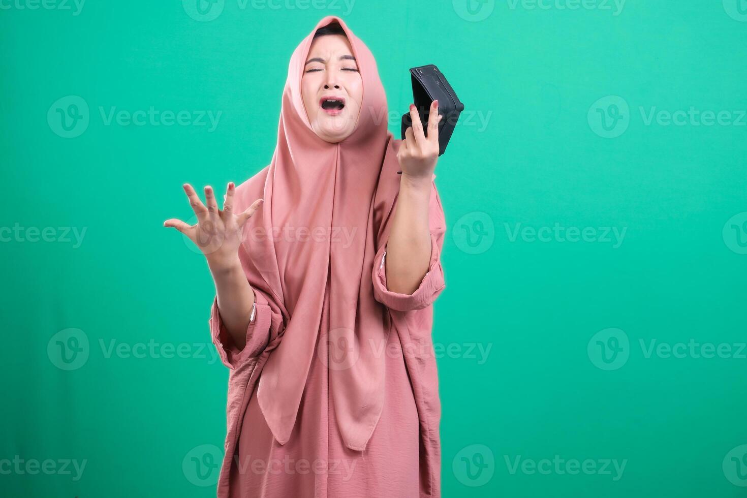 Financial desperation portrayed by woman with an empty wallet in photo