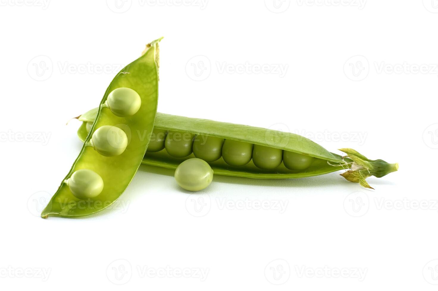 Fresh pea pods with vibrant green peas, isolated on a white background. photo
