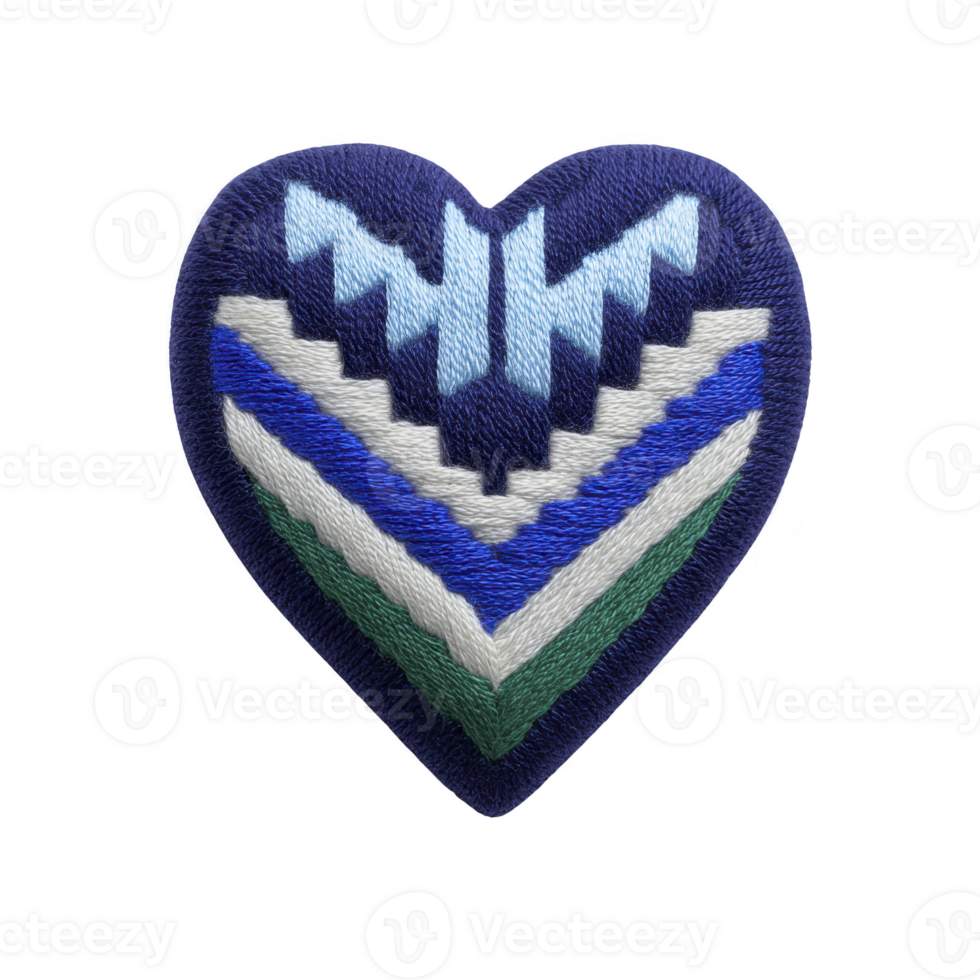 Heart shaped patch with geometric pattern in blue, white, and green, featuring zigzag designs. embroidery creates textured appearance, adding depth and interest to design png
