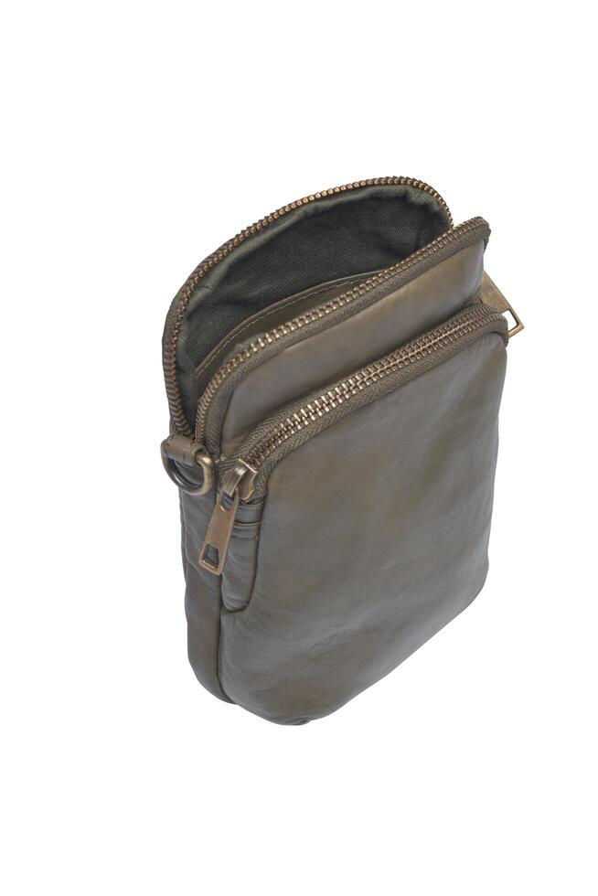 Olive green leather crossbody bag with multiple zipper compartments isolated on white photo