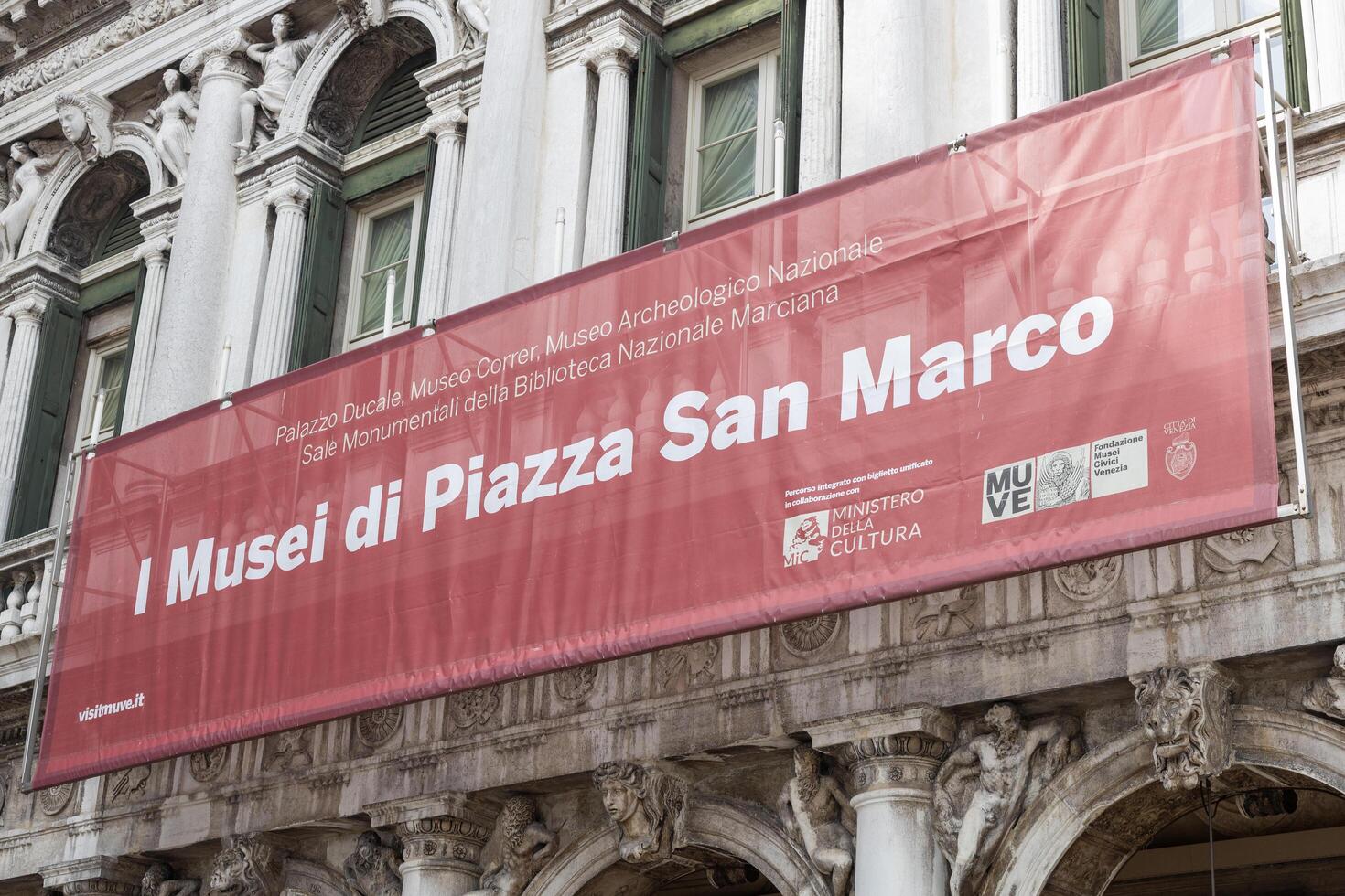 Venice, Italy - April 21 2025 Cultural banner for I Musei di Piazza San Marco on historic facade photo
