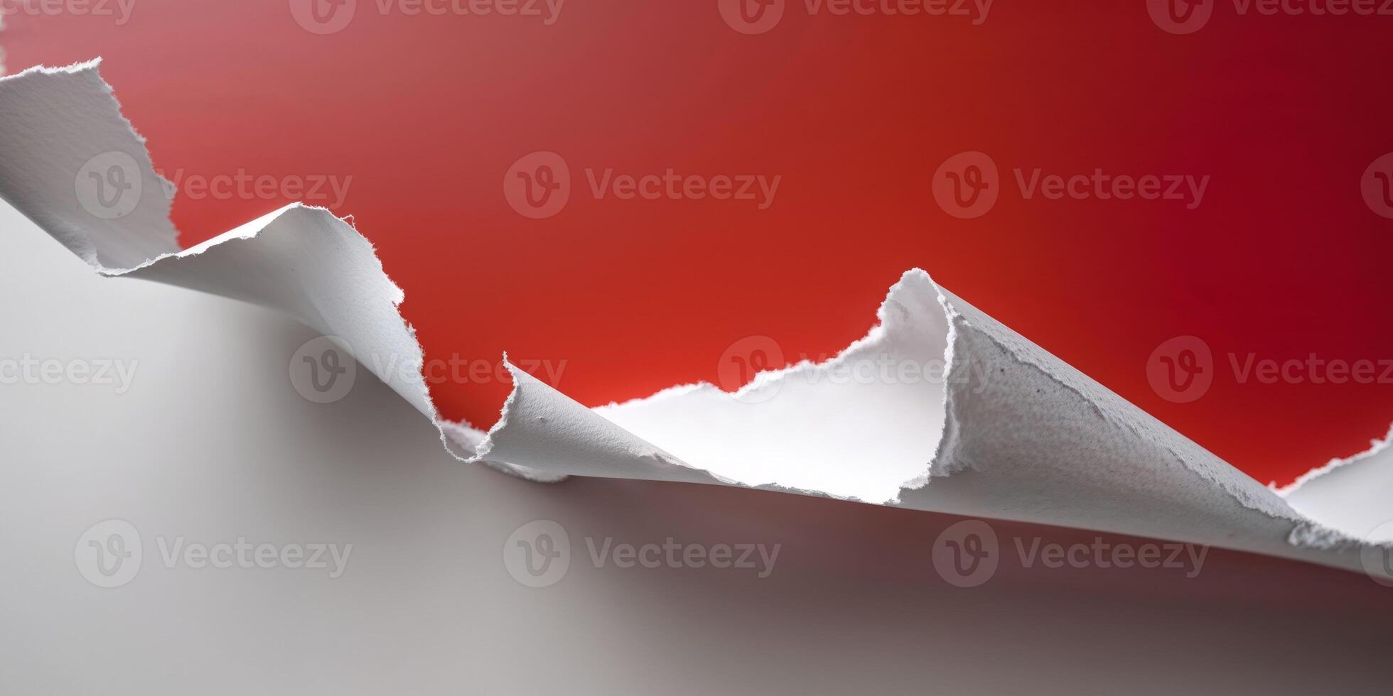 A red and white paper torn into pieces photo