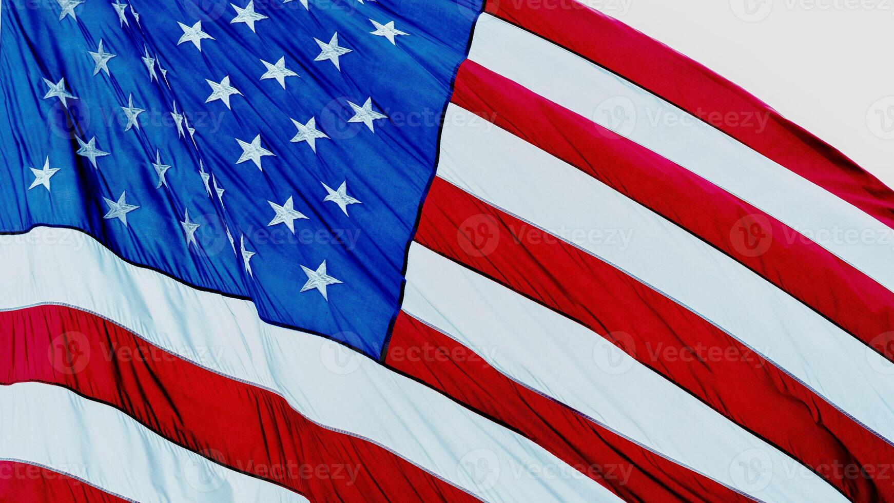 Patriotic american flag waving stars and stripes usa symbol closeup view photo