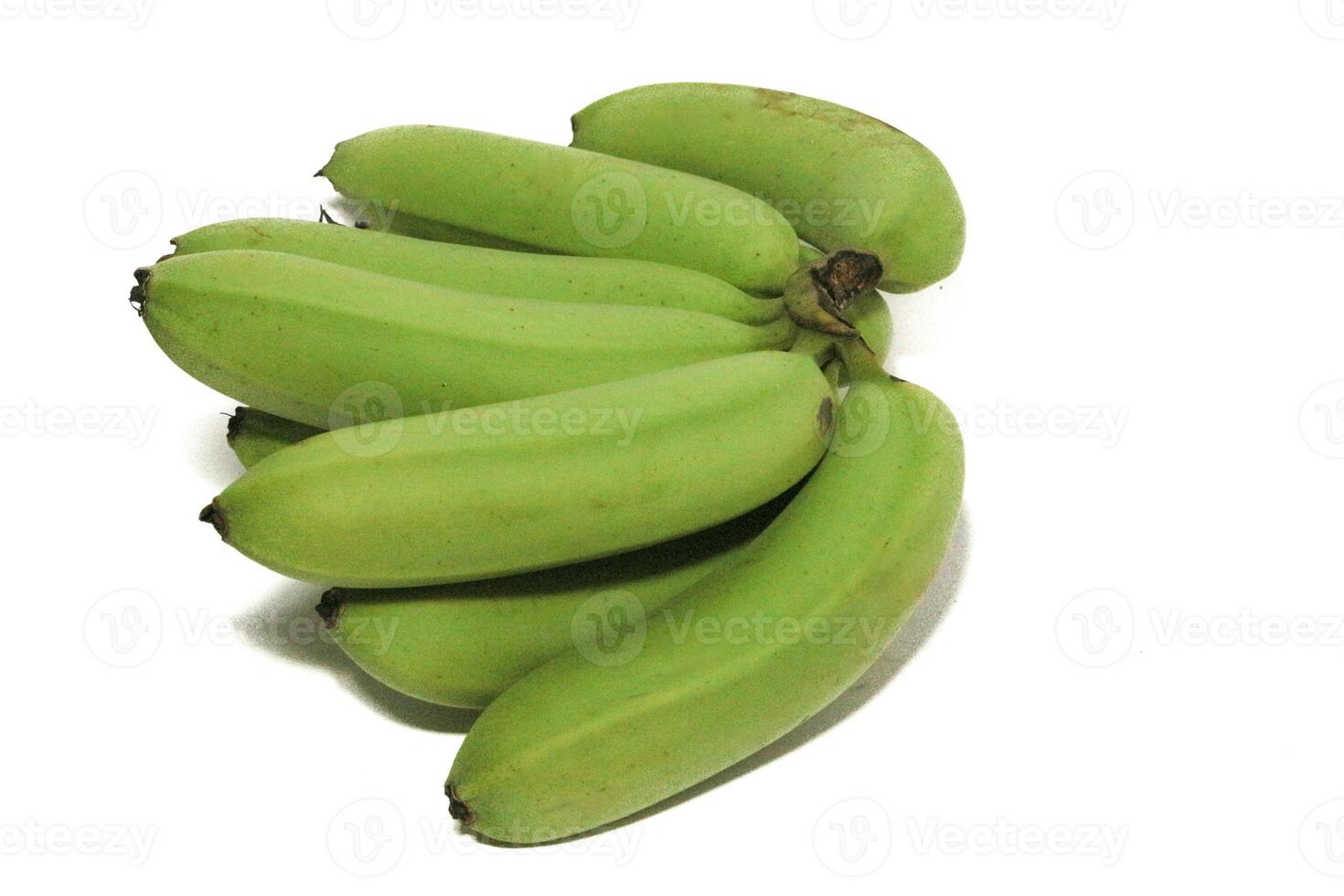 A green banana, after harvest, in a woven bamboo container, panen pisang cavendish, pisang ambon hijau, dari kebun, Ambon bananas, sweet, savory and a little sour, after harvest, rasanya manis gurih photo