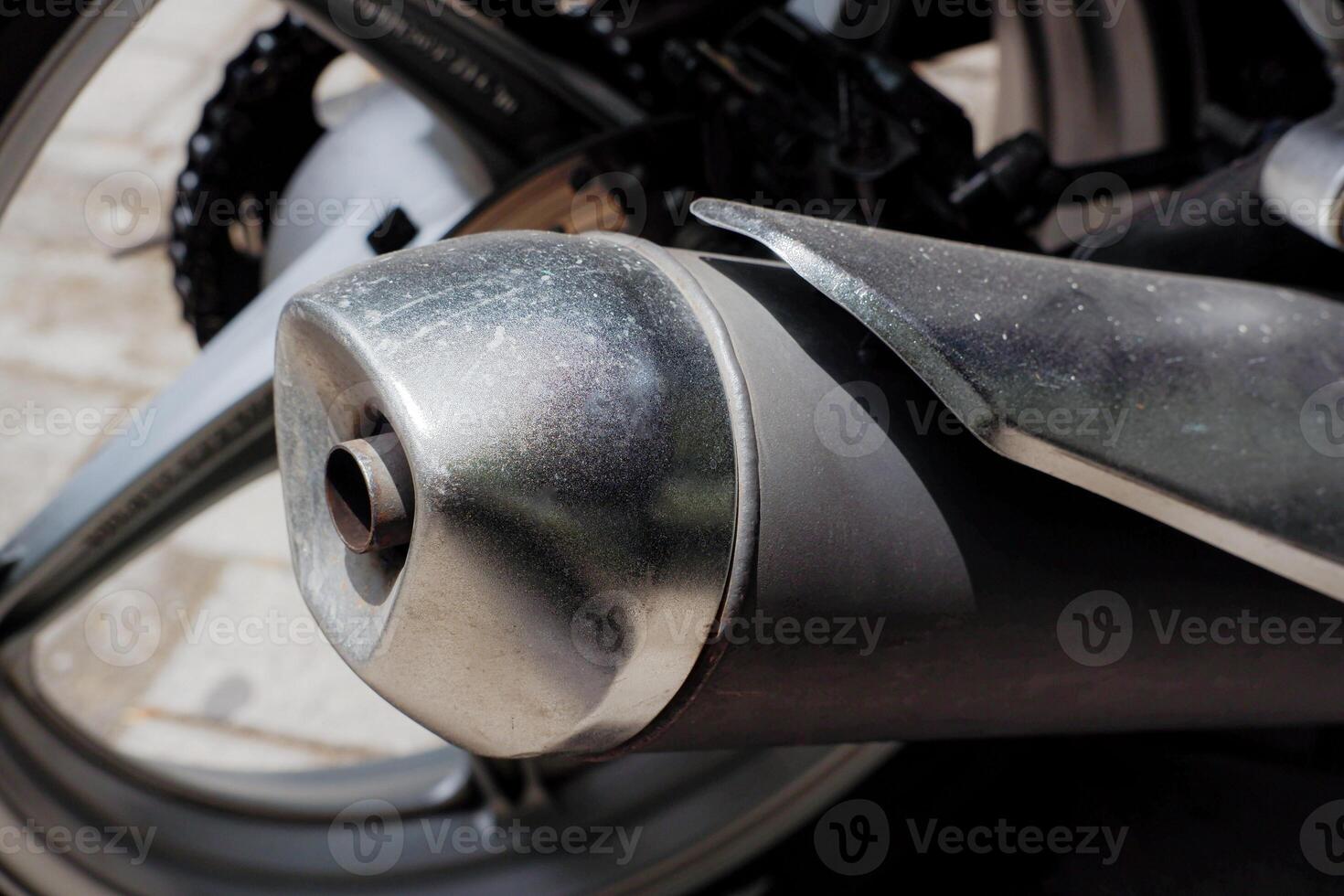 details of motor vehicle exhausts that often cause smoke and pollution photo