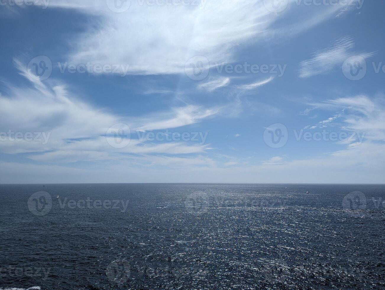 Breton Coastal View Blue Sky, Clouds, and Horizon over Water photo