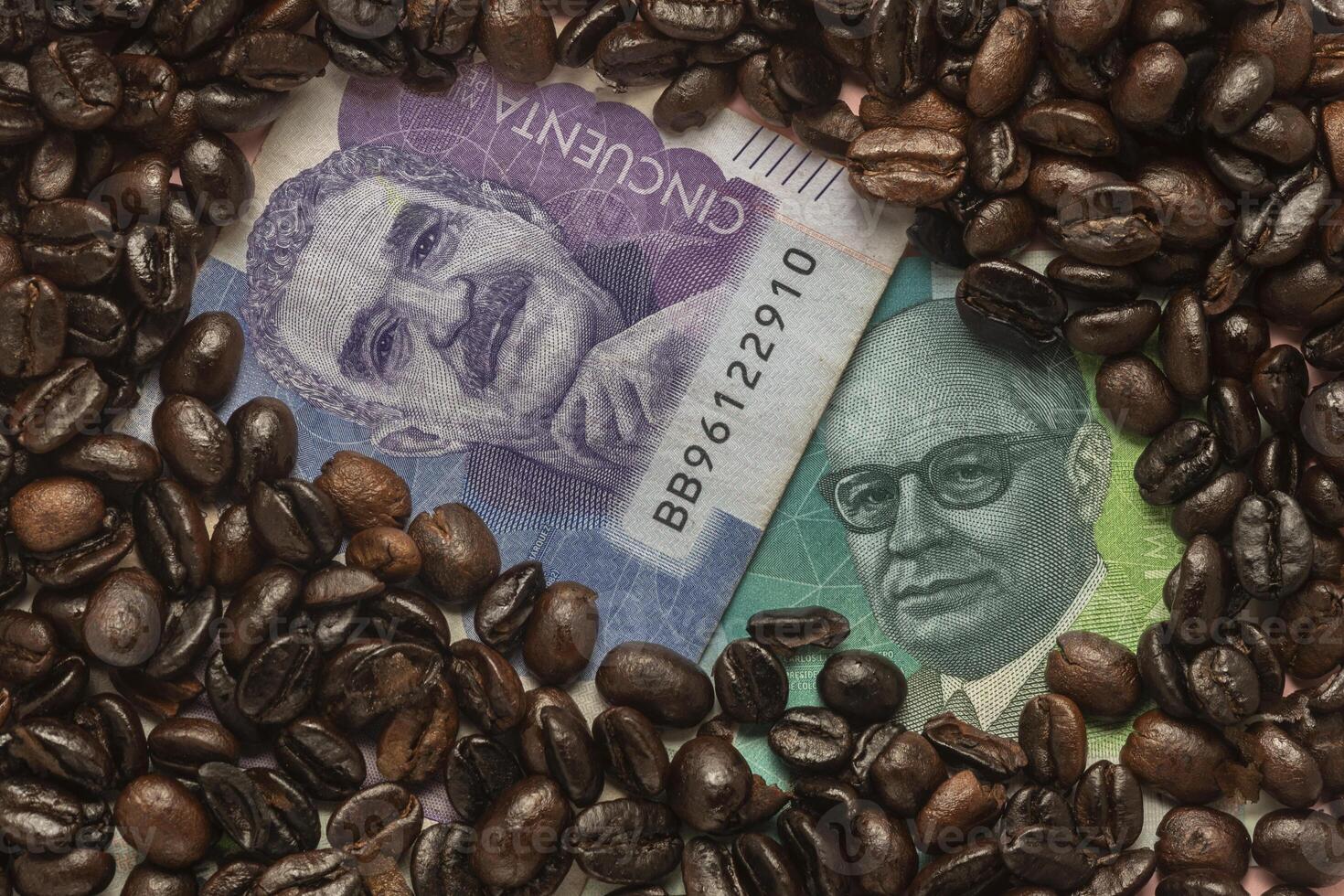 Roasted coffee beans and Colombian pesos photo