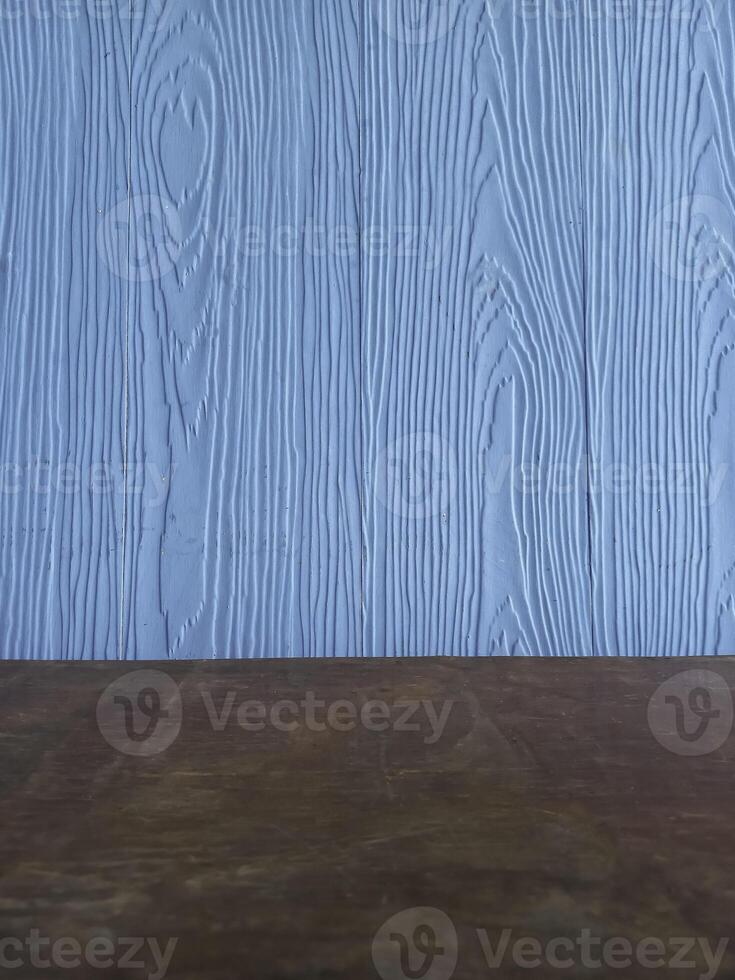 The surface has a blue wood pattern that imitates nature. photo