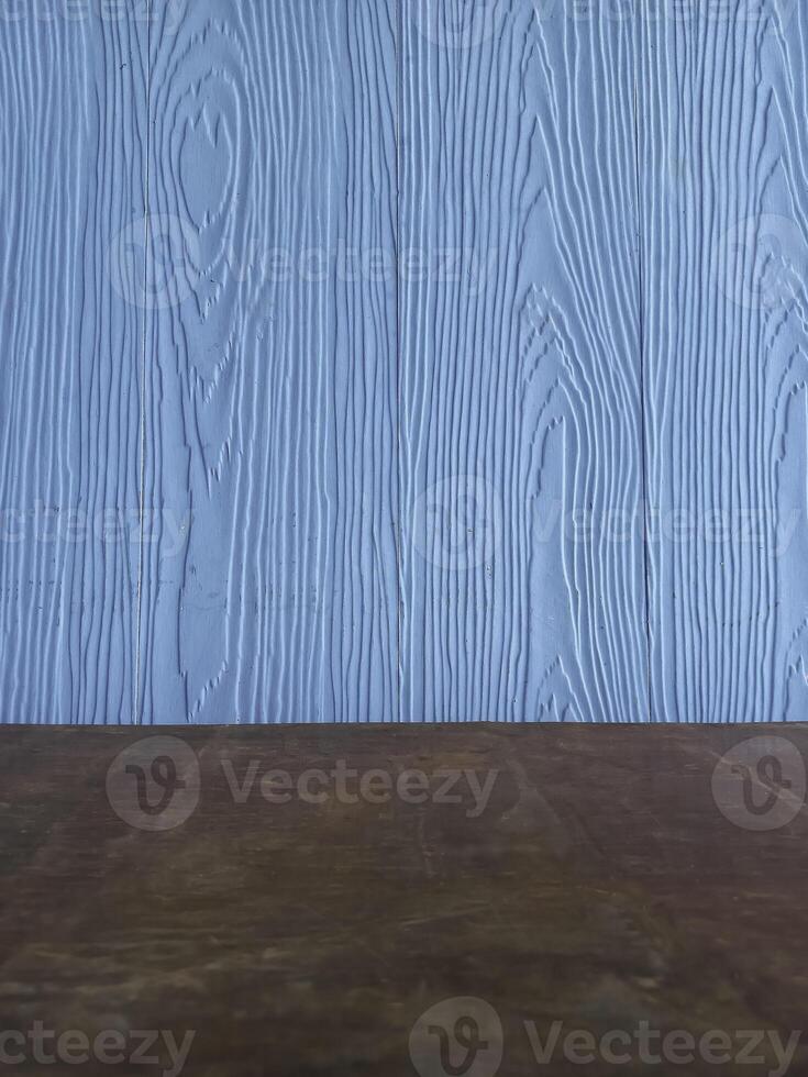 The surface has a blue wood pattern that imitates nature. photo