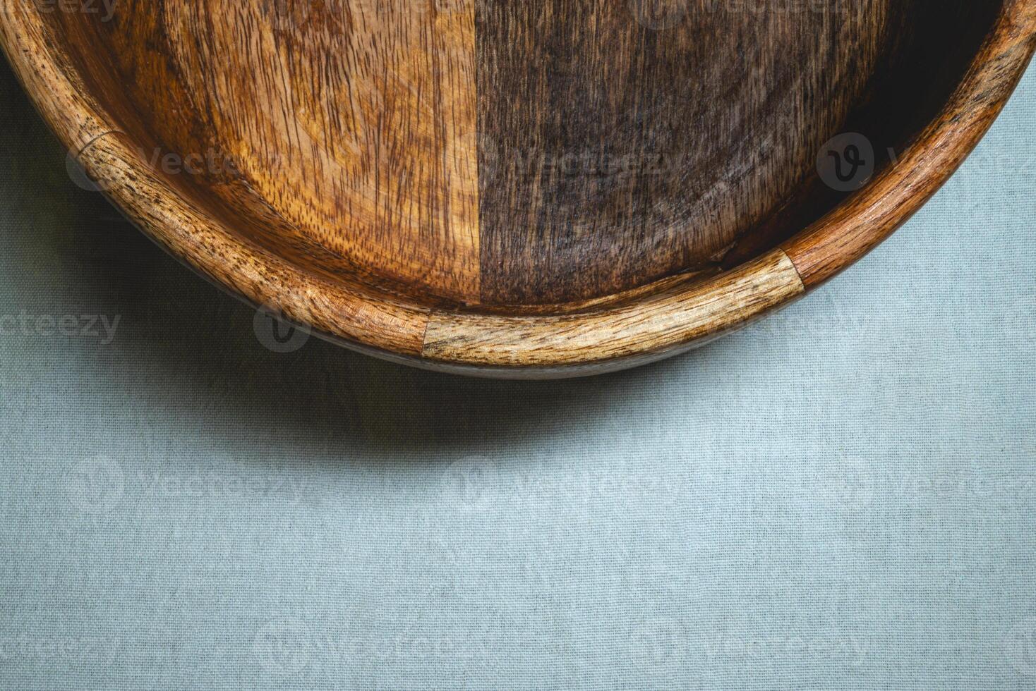 Stacked Wooden Bowls on Textured Background photo