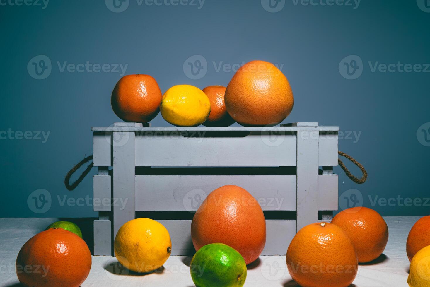 Citrus Assortment on Wooden Crate photo
